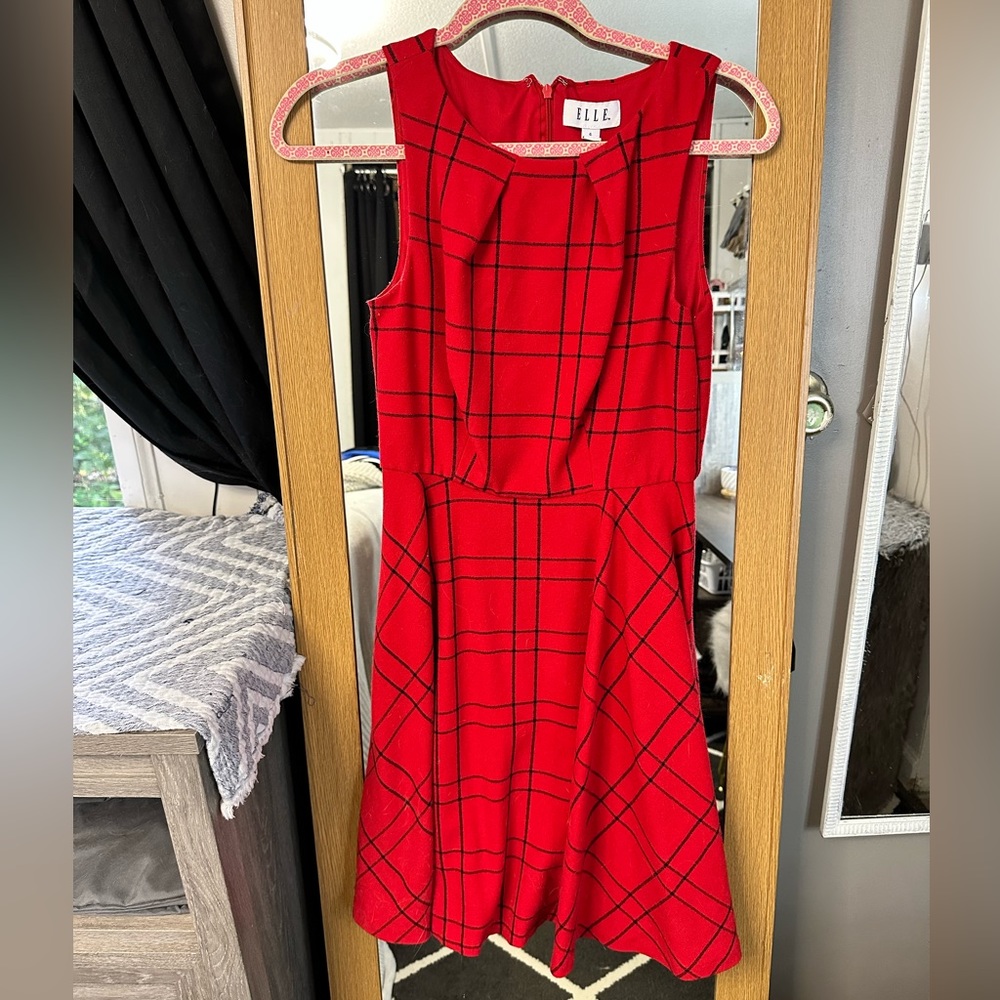 Very cute plaid red work dress. Heavy material for all seasons.